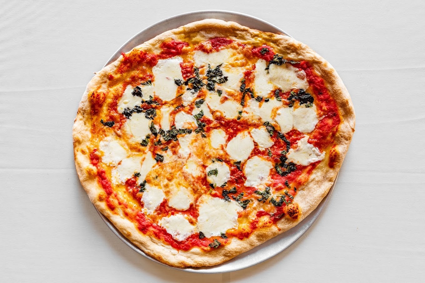 Explore the mouthwatering menu at Rockafeller’s Pizzas, where traditional flavors meet creative culinary twists